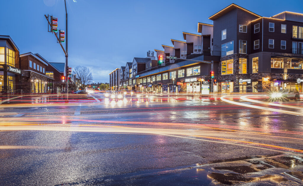 Downtown Rexburg Idaho along University Boulevard at night with long exposure light trails near Porter Park, The Cedars, and The Cove